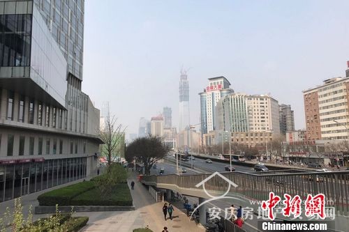 圖為北京雙井附近的寫字樓和居民住宅樓。 中新網(wǎng) 程春雨 攝